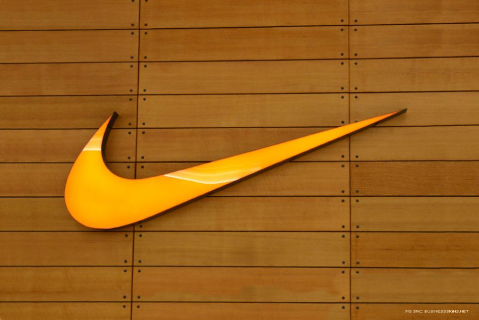 Nike Swoosh Logo on a Wooden Wall